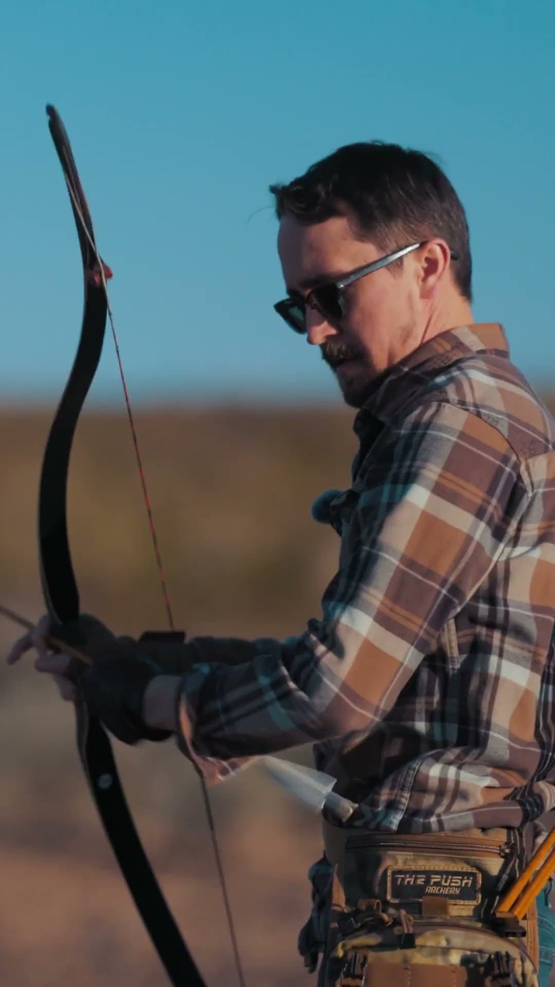 Traditional Archery Practice with a Paper Target